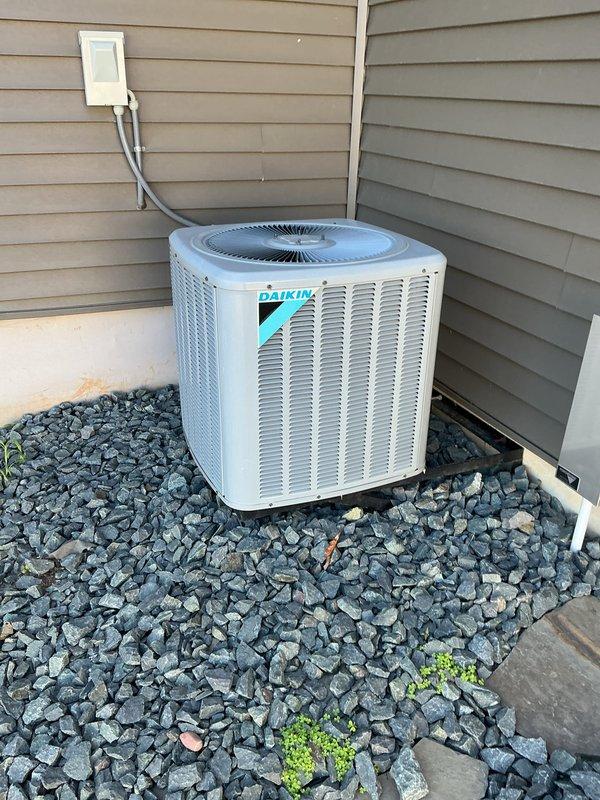 Completed routine cooling maintenance tune-up on 9-year-old Daikin air conditioning system. Performed comprehensive inspection of outdoor condenser unit and verified proper operation of all components. System found to be in good working condition with dual capacitor and hard start kit previously installed during last year's service visit, both functioning as designed.