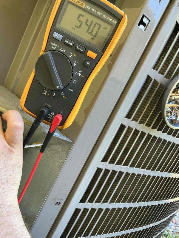 Completed annual cooling maintenance on two Bryant heat pump systems (4 and 19 years old). Performed comprehensive tune-up including inspection of all components, verification of refrigerant charge levels, condenser coil cleanliness assessment, capacitor testing, contactor evaluation, and motor/compressor operation checks. Found fan capacitor on older unit reading out of specification at 540 microfarads. Verified both heat exchangers in good condition, evaporator coils clean, and temperature drop adequate for proper cooling operation on both systems. Noted filters require replacement. Discussed findings and recommended capacitor replacement for continued reliable operation of the older unit.
