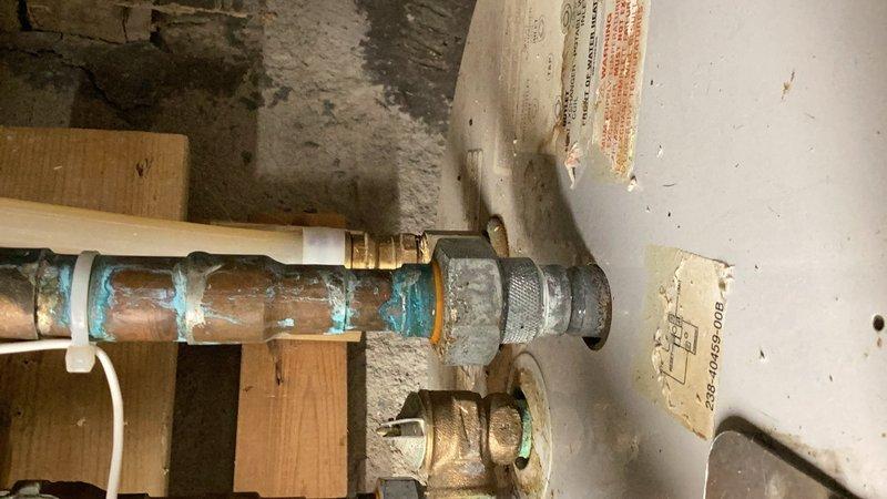 Responded to complaint of excessively hot domestic water temperature. Found domestic hot water at 170° with boiler cycling continuously. Boiler heating parameter was incorrectly configured, causing system to run nonstop and overheat domestic water supply. Drained water heater to reduce temperature to 110° at tap, then adjusted boiler parameters to proper settings. Configured domestic hot water to heat to 130° and set heating parameter reset for air handler operation at 140°. Tested both domestic hot water delivery and hydronic heating system to verify proper operation. System now functioning correctly with appropriate temperature control for both domestic water and space heating.
