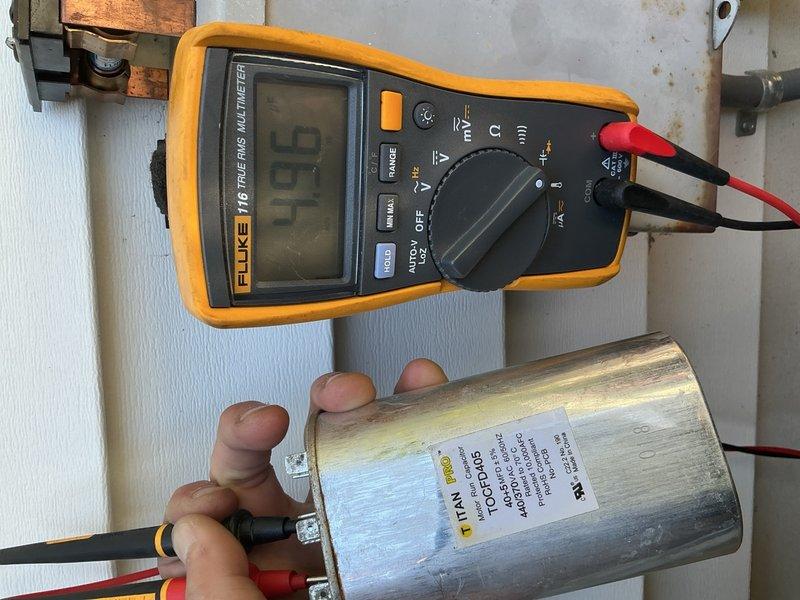 Completed annual cooling maintenance visit on AC system as part of preventative maintenance agreement. During inspection, identified contractor in outdoor unit producing abnormal buzzing sound during operation. Performed diagnostic testing using digital multimeter to assess capacitor function and electrical readings. Determined contractor requires replacement to restore proper system operation. Documented findings with diagnostic photos and provided estimate for replacement part to customer.
