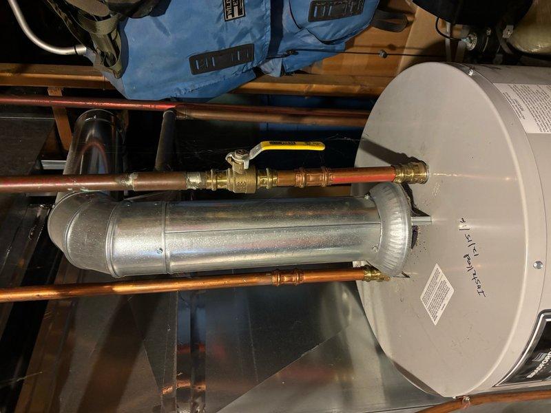 Performed complete flush and inspection on natural gas atmospheric vented 40-gallon water heater. Drained sediment from tank, inspected all plumbing connections including copper supply lines and brass ball valves for proper operation and potential leaks. Evaluated overall condition of unit and surrounding components. Customer requested replacement estimates during service visit, and comprehensive pricing options for new water heater installation were provided for review.