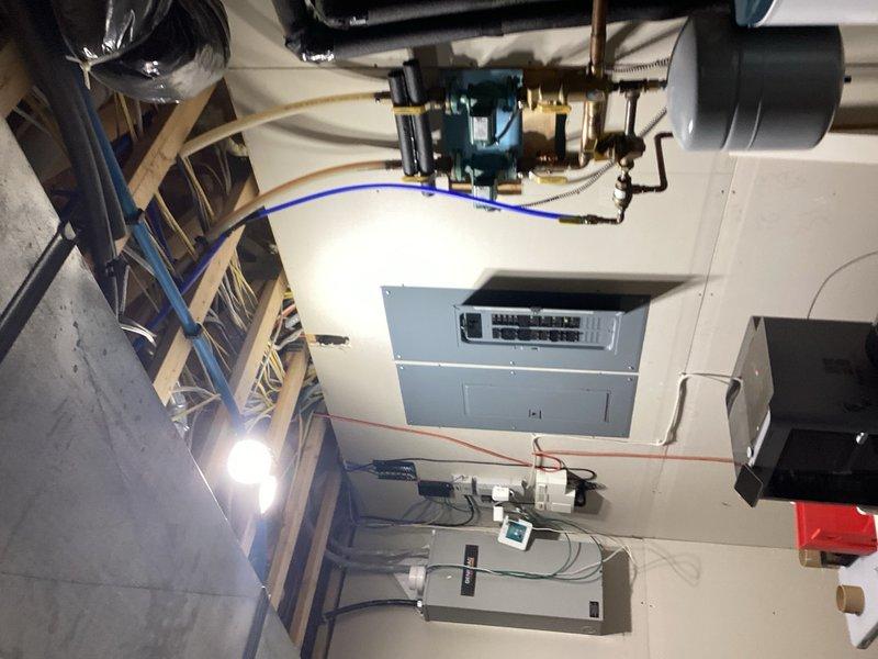 Performed routine maintenance inspection on geothermal cooling system under membership agreement. Checked operating temperatures, pressures, and all system components. Discovered the right-side geothermal loop pump had seized and was drawing electrical current without rotating. Disconnected power to the failed pump to prevent further electrical consumption and damage. Attempted manual rotation of pump shaft but confirmed unit requires replacement. Documented findings with photos and completed replacement request form for new loop pump.