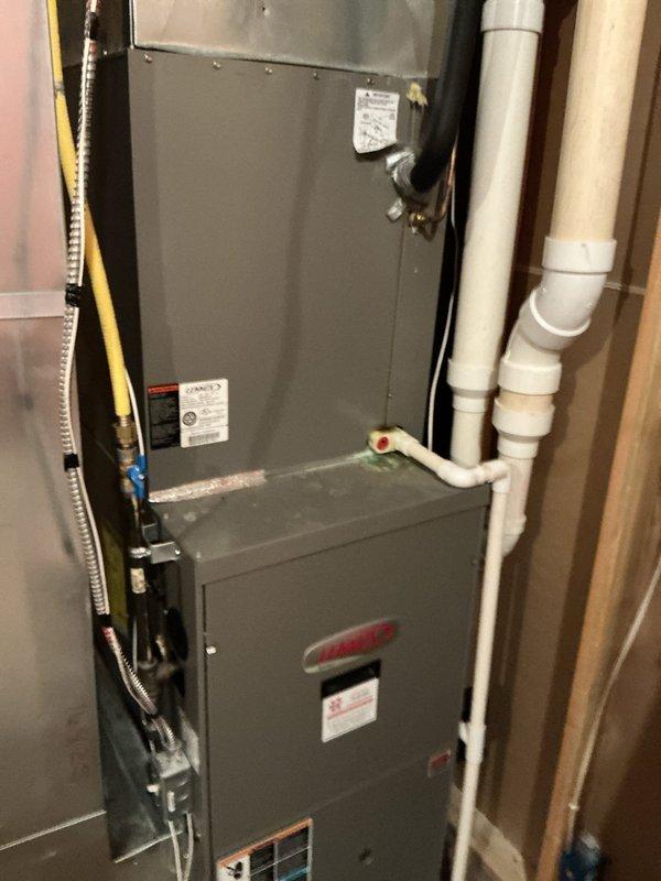 Completed comprehensive AC maintenance tune-up on 17-year-old forced-air system. Unit is functioning properly at this time, with all components inspected and serviced according to maintenance agreement specifications. Comfort advisor recommendations provided for aging equipment.