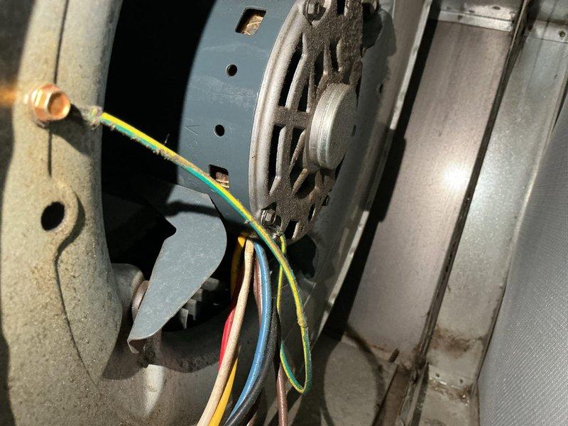 Performed comprehensive second opinion inspection on furnace and air conditioning system. Upon arrival, customer reported blower motor overdrawing amperage, suspected due to pet hair accumulation, and AC unit requiring multiple manual start attempts before maintaining operation.

Conducted thorough system evaluation of both heating and cooling equipment. Inspection revealed extensive contamination of furnace blower wheel and secondary heat exchanger with accumulated debris, significantly restricting airflow and causing excessive system strain. Both blower motor and inducer motor exhibited oil leakage, indicating bearing failure from prolonged operation under stress conditions. 

Heat exchanger inspection identified critical concerns including severe temperature stress points, advanced rust formation, and corrosion throughout multiple sections. Visual assessment confirmed areas approaching failure threshold with potential breach points developing. Documented conditions with photographic