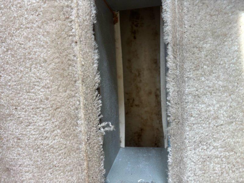 Completed comprehensive duct cleaning service on 13-run system with significant dust and debris accumulation throughout supply and return ducts. Performed thorough cleaning of rigid pipe dryer vent system in conjunction with ductwork service. Photographic documentation revealed interior duct corrosion with rust staining and moisture damage indicators, along with deteriorated wall penetrations requiring attention at register locations.
