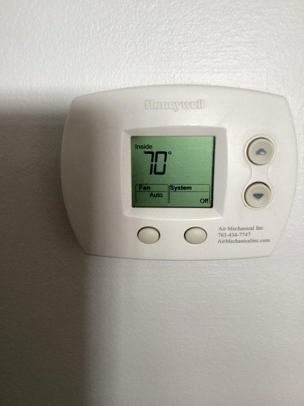 Completed annual cooling maintenance visit and preventative maintenance tune-up on older Lennox furnace and air conditioning system. Performed comprehensive spring inspection of HVAC equipment, verified thermostat operation showing 70° with system in off mode and fan set to auto, and inspected all accessible components including ductwork, PVC condensate lines, and refrigerant piping. No deficiencies identified and no repairs required at this time.