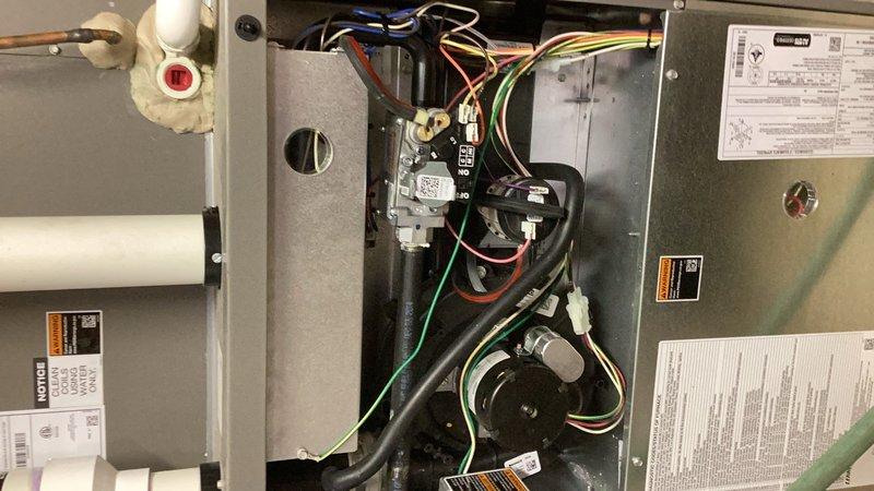 Completed comprehensive furnace and air conditioning tune-up on residential HVAC system. Performed thorough furnace inspection including venting, exhaust flue, and camera inspection of heat exchanger. Evaluated burners, blower assembly, inducer motor, pressure switch, safety switches, and limit switches for proper operation. Tested flame sensor, igniter, gas pressures, and combustion air levels. Cycled heating system through all operational modes to verify safe and proper function.

Conducted complete air conditioning system evaluation including inspection of evaporator coil, blower motor, and air filter. Examined outdoor condenser unit, condenser coil, contactor, compressor, and associated electrical components. Verified refrigerant charge levels within manufacturer specifications. Cleaned condenser coil to optimize heat transfer efficiency. Cycled cooling system through operational modes to confirm proper performance. Both heating and cooling systems found to be operating within norm