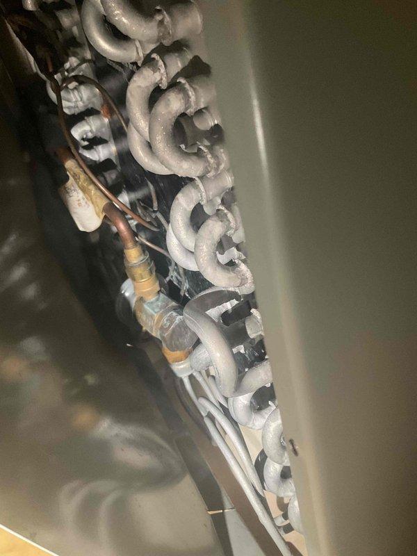 Completed annual air conditioning tune-up and preventative maintenance inspection. System evaluated and found operating within normal parameters with no deficiencies noted. Inspected capacitor, motor assembly, electrical connections, and refrigerant piping system. All components functioning properly with no issues identified.