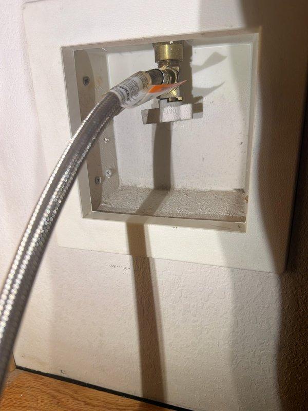Responded to service call for compromised copper water line supplying refrigerator icemaker. Upon inspection, determined existing icemaker shut-off valve was broken and required replacement. Removed failed copper line and defective shut-off valve, then installed new quarter-turn ball valve with brass fittings in recessed wall box. Connected refrigerator to new water supply using braided stainless steel flexible supply line with proper compression fittings. Tested system for leaks and verified proper water flow to icemaker unit upon completion.