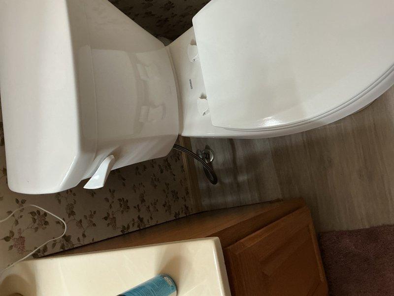 Provided estimate for replacement of two 30-year-old toilets with ADA-compliant units and presented multiple options to customer. Successfully installed two new ADA toilets upon approval. Additionally diagnosed low water pressure issue at kitchen faucet and determined that the touchless faucet's solenoid valve had failed and requires replacement.