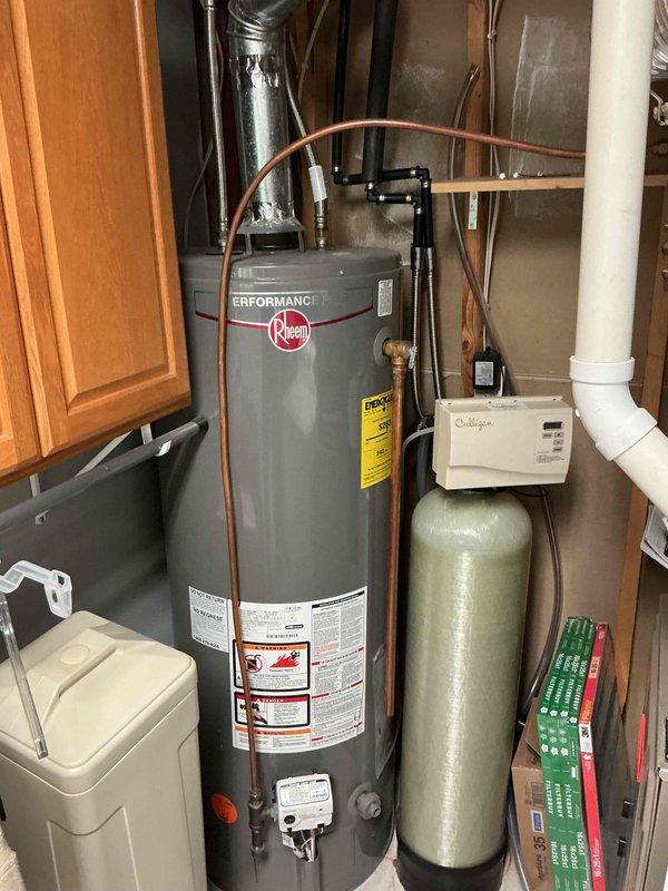 Completed follow-up plumbing inspection to investigate recurring sewer odor emanating from dishwasher area. Performed comprehensive evaluation of drainage system, P-trap configuration, air gap assembly, and venting connections associated with dishwasher discharge line. Inspected utility room plumbing infrastructure including water heater connections, supply lines, and drainage systems to identify potential sources of sewer gas infiltration.