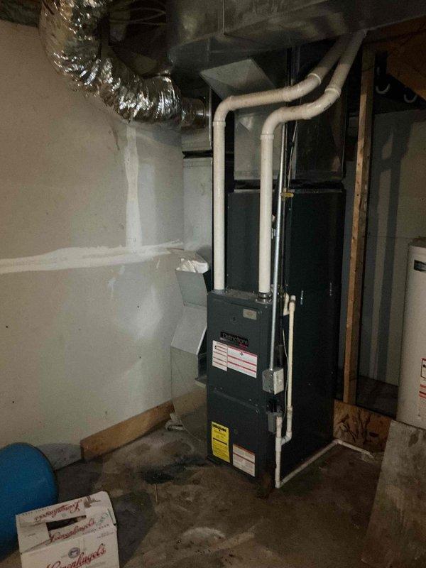 Responded to service call for newly purchased home where gas service had been disconnected for two years. Upon arrival, confirmed utility company had placed lock on gas meter pending required gas line inspection. Performed visual inspection of basement mechanical room, documenting furnace unit, water heater, and associated gas piping system with photographs. Coordinated with utility company to determine required inspection procedures and next steps for gas service restoration, as homeowner had not received documentation outlining reinstatement requirements.