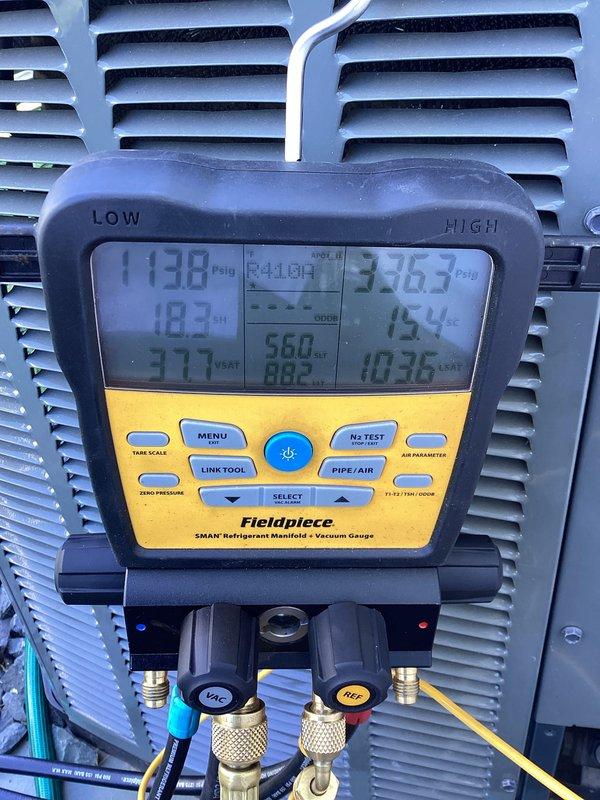 Completed comprehensive air conditioning tune-up on 7-year-old system with no prior reported issues. Performed full system diagnostics using refrigerant manifold gauges, verifying pressures and temperatures within manufacturer specifications. Inspected existing Genteq capacitor showing signs of age and weathering, provided customer option for preventative replacement to ensure continued reliable operation.