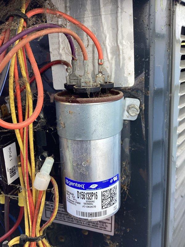 Completed comprehensive air conditioning tune-up on 7-year-old system with no prior reported issues. Performed full system diagnostics using refrigerant manifold gauges, verifying pressures and temperatures within manufacturer specifications. Inspected existing Genteq capacitor showing signs of age and weathering, provided customer option for preventative replacement to ensure continued reliable operation.