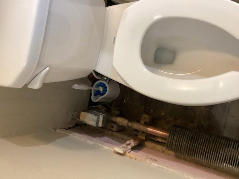 Responded to no heat call at commercial facility. Began replacement of 7 zone valves with 3/4" fittings, including installation of necessary reducers (1 1/4" to 3/4" and 1" to 3/4") and new T4 thermostat. Work in progress with two technicians on site; zone valve replacement partially completed and will require additional time to finish installation and restore full heating functionality to all zones.