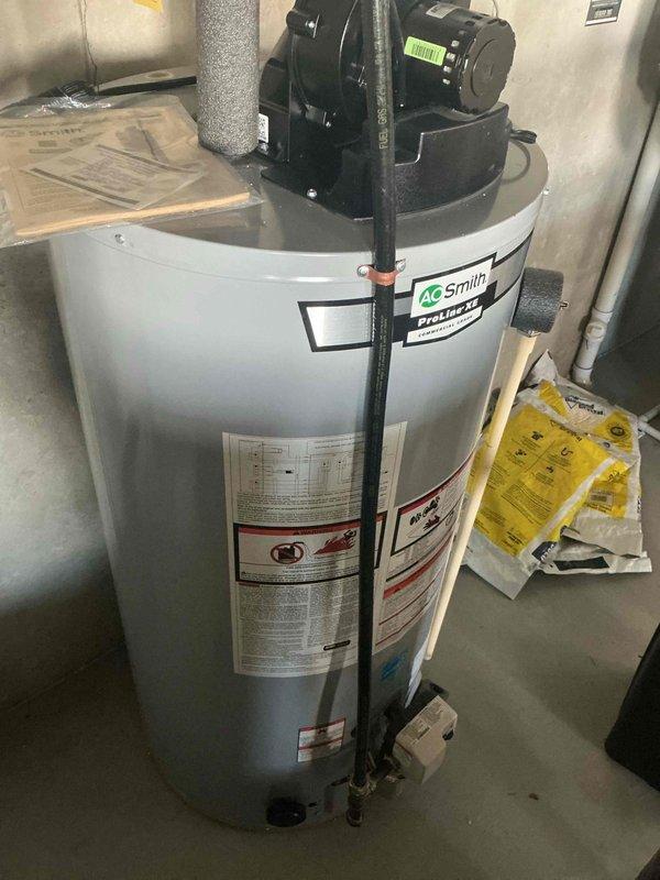 Completed annual cooling maintenance on 5-year-old air conditioning system and air exchanger. Performed comprehensive AC tune-up including refrigerant level verification, pressure testing, and component inspection. Refrigerant charge confirmed adequate with slightly low subcool reading, though system pressures remain within acceptable parameters. All mechanical and electrical components operating properly to manufacturer specifications, with unit confirmed fully operational. Noted exterior main water line leak requiring attention, likely requiring connection tightening.