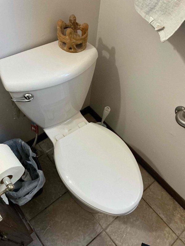 Responded to service call for whistling toilet and dishwasher drainage issues. Completed full replacement of two existing toilets with new Toto comfort height elongated ADA-compliant models. Removed old fixtures, installed new toilets with proper sealing and water supply connections, and tested both units for proper operation and leak-free performance.
