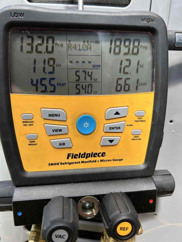 Performed comprehensive AC system evaluation including inspection of Ritz coil and all major components. Filter, blower assembly, and evaporator coil were found clean and in good condition. Homeowner reported inadequate cooling performance from previous season. Conducted operational test which revealed suboptimal 12-degree temperature split across the evaporator. Connected refrigerant manifold gauges and confirmed system pressures appear low, even with condenser unit covered during testing. Inspected electrical components including dual capacitors and associated wiring, all connections secure and functioning properly. Recommended follow-up appointment to verify refrigerant charge and system pressures once ambient temperature reaches minimum 60 degrees for accurate diagnostics.
