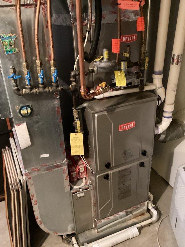 Responded to gas leak behind range that had been located by utility company. Upon inspection, discovered small leak at fitting just below flare whip connection. Tightened fitting, applied new pipe dope, and reattached whip. Verified repair with electronic leak detector showing no further leaks. Inspected opposite side of whip assembly including shutoff valve and copper flare connection, finding additional small leak at fitting below flare whip. Tightened fitting, applied new pipe dope, and reattached whip. Conducted final leak detection testing with ELD on all connections, confirming all repairs leak-free and system safe for operation.