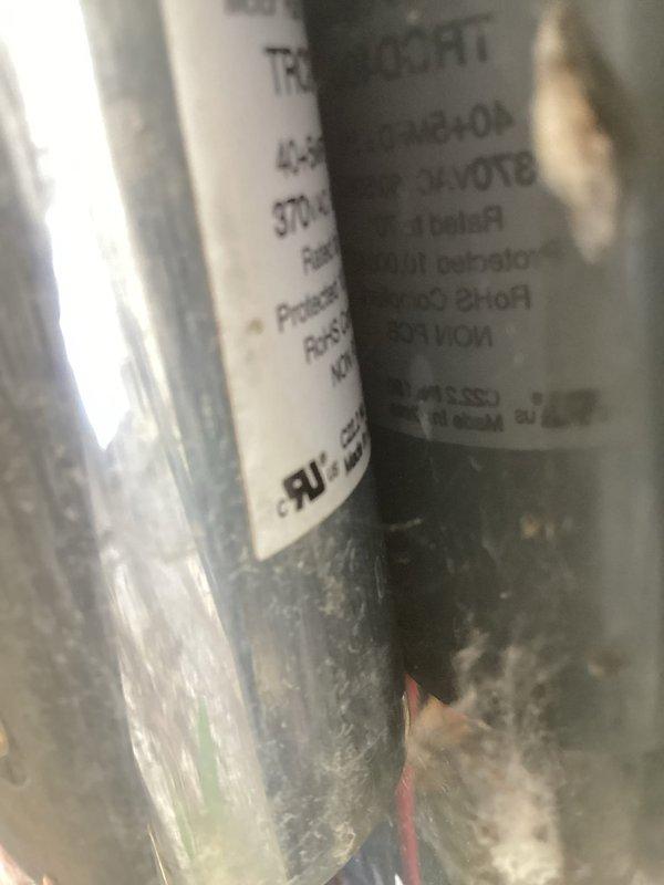 Performed annual cooling maintenance on two air conditioning systems as part of membership agreement. During inspection, identified a failed capacitor on one unit. Tested capacitor with multimeter to confirm failure and completed replacement to restore proper system operation.