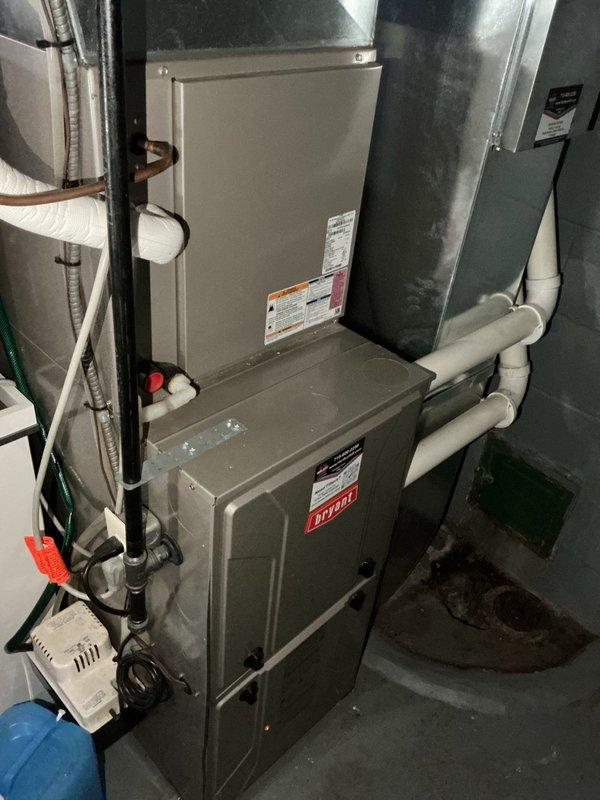 Completed comprehensive annual maintenance and tune-up on 8-year-old Bryant air conditioning system. Performed thorough inspection of outdoor condenser unit including electrical components verification, condenser coil cleaning, and wiring inspection—all components found operating within specifications. Indoors, verified fresh air filter, flushed evaporator drain line, inspected furnace electrical connections, and confirmed blower motor settings appropriate for cooling operation. System startup test achieved 21° temperature split across evaporator coil, confirming proper refrigerant charge and system performance. All maintenance items completed per agreement specifications with unit operating efficiently.