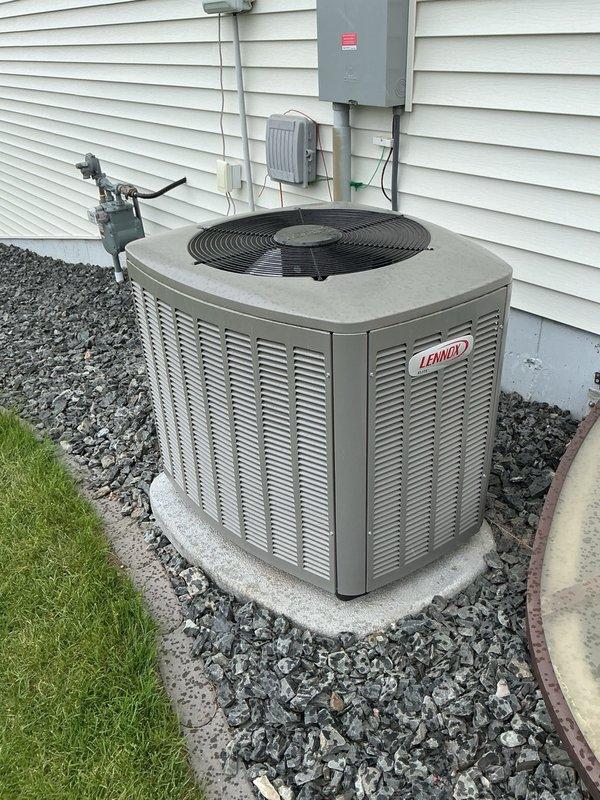Responded to no cooling call on Lennox air conditioning unit that was tripping the breaker upon startup. Homeowner reported the issue occurred intermittently when the system sat idle for several days, typically tripping within five seconds of operation, but would run normally after resetting the breaker and attempting a second start.

Performed diagnostic testing of all electrical components including contactor, capacitor, and compressor windings. All components tested within manufacturer specifications with no abnormal amperage draws detected during startup at time of inspection. Based on symptom pattern and diagnostic findings, determined the compressor was experiencing hard start conditions due to refrigerant migration during extended off cycles, causing liquid refrigerant to settle in the compressor.

Installed hard start kit to assist compressor during startup and prevent nuisance breaker trips. Hard start kit provides additional starting torque to overcome liquid refrigerant in c