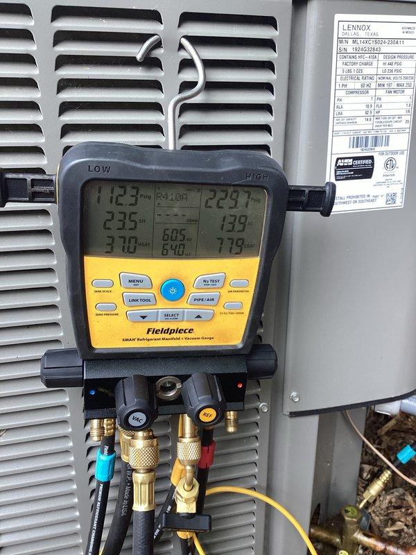 Responded to no cooling call on Lennox ML14XC1S522 central air conditioning unit experiencing frozen evaporator coil with ice formation on outdoor unit. Found severely restricted airflow caused by heavily soiled air filter. Replaced dirty filter with new unit, allowed system to thaw, and performed diagnostic testing with manifold gauges to verify proper refrigerant pressures and system operation. System restored to normal cooling function with proper airflow and temperature differential.
