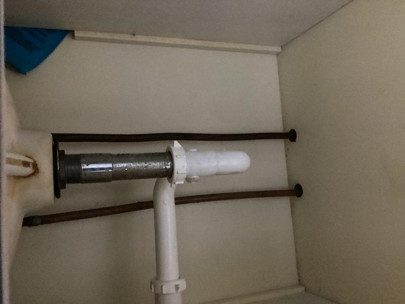 Installed customer-supplied bathroom lavatory faucet with complete drain assembly and pop-up mechanism. Provided estimate for lavatory faucet replacement including two new shut off valves with supply lines, which was not approved at this time.