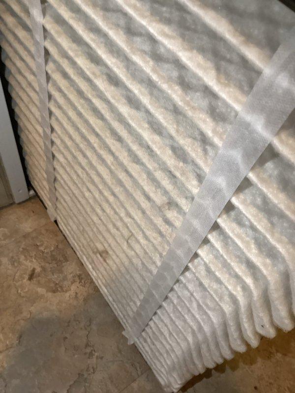 Performed routine air conditioning tune-up and maintenance on Heat n Glo system as part of preventative maintenance agreement. System operational and cooling properly, verified thermostat functionality showing OFF mode. Inspected air filter showing moderate dust accumulation from normal use. Identified weak contactor during electrical component inspection and completed replacement to prevent future failure. Confirmed contact information on file with customer.