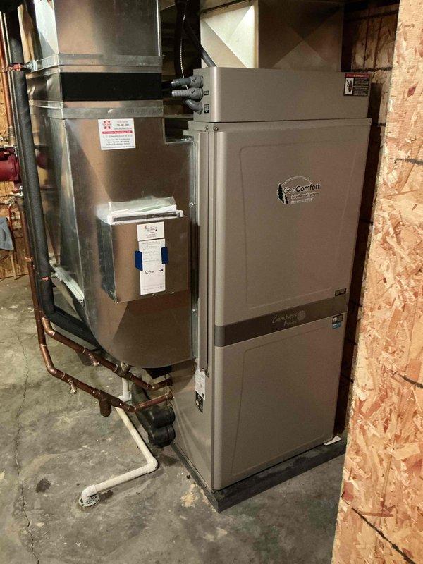 Completed seasonal air conditioning tune-up on 12-year-old GeoComfort geothermal system. Cleaned condensate drain line, tested all components and electrical connections, and verified proper operation of equipment in cooling mode with all systems functioning within normal parameters.