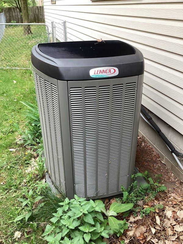 Completed routine membership AC tune-up on 6-year-old Lennox condenser unit. System inspection confirmed effective cooling with good temperature splits, clean air filter, solid electrical connections, and refrigerant levels within acceptable range. External unit showed accumulation of leaves and cottonwood debris but was otherwise clean. During testing, capacitor was found to be out of range, which could cause compressor failure and system shutdown. Replaced defective capacitor to restore proper operation and prevent potential equipment failure. All system parameters verified within manufacturer specifications upon completion.