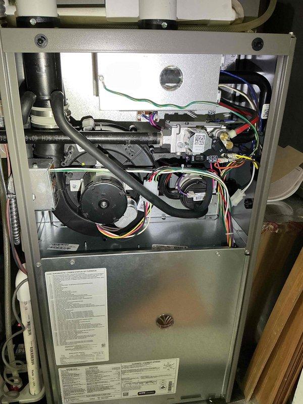 Completed seasonal cooling maintenance and AC tune-up on a 2-year-old Lennox heat pump system. Performed comprehensive inspection of indoor air handler and outdoor condensing unit, verified operational status of all components including blower motors, gas valve assembly, electrical connections, and drainage systems. All equipment found to be functioning properly with no issues identified during this family rewards cooling visit.