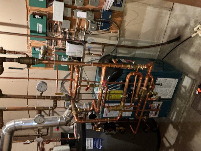 Completed annual cooling maintenance on two AC systems. During inspection, discovered the garage attic air handler evaporator coils are contaminated with dirt and mold requiring professional cleaning. The larger AC unit's liquid line refrigerant service port cap is seized and will need replacement for future service access. Provided estimate for evaporator coil cleaning service to address the contamination issue.