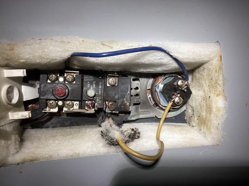 Responded to no hot water complaint on electric tanked water heater. Upon inspection, found tripped breaker and failed upper heating element with visible damage to electrical components. Replaced faulty upper element and restored power to unit. Performed comprehensive electrical testing on both upper and lower heating elements, thermostats, and all associated wiring to verify proper voltage and functionality throughout the system. Confirmed unit began heating properly after repairs. Provided replacement options for future consideration given the unit's history as a warranty replacement and ongoing concerns about equipment longevity at this location.
