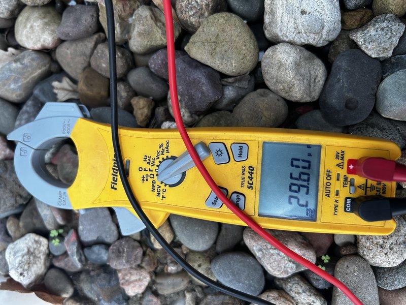 Completed comprehensive AC tune-up on 10-year-old system with no prior known issues. Performed full system operational testing, verified air filter condition (clean), cleared condensate drain line, and tested blower capacitor (reading within normal parameters). Cleaned condenser coil, inspected all outdoor components including compressor, fan motor, and electrical connections. Measured system performance with temperature split of approximately 19°F across evaporator coil, confirming optimal cooling efficiency. All components operating within manufacturer specifications with no deficiencies noted.