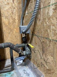 Responded to a water leak at the pressure tank assembly. Upon inspection, identified two leak sources: a faulty pressure switch and a deteriorated ball valve. Replaced the ball valve, pressure switch, pressure gauge, and pressure tank drain valve to restore system integrity and prevent further water damage.