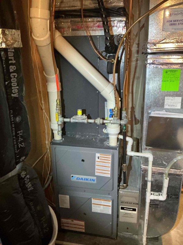 Completed annual AC maintenance tune-up on a 6-year-old Daikin system. The condenser coil had accumulated significant dust and debris buildup, which was thoroughly rinsed and cleaned to restore proper airflow and system efficiency. All system components were inspected and found to be operating within normal parameters with no additional issues identified.