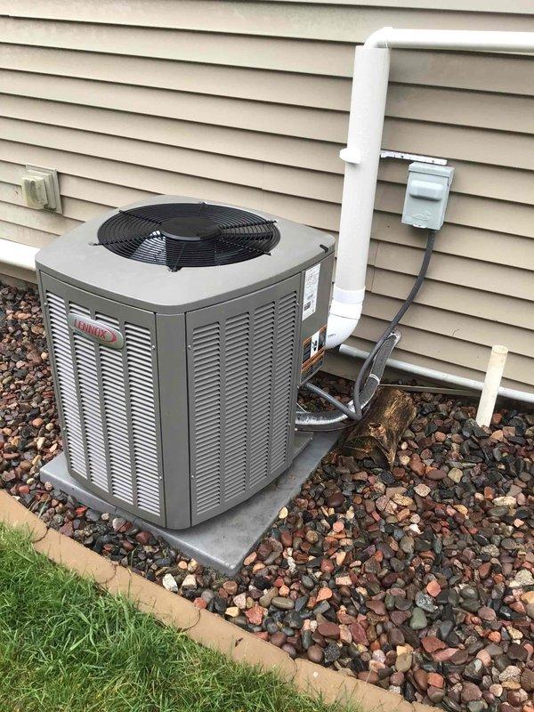Completed comprehensive AC tune-up on 5-year-old system including washing outdoor condenser unit, testing electrical components (all readings within manufacturer specifications), and verifying airflow with 20° temperature drop across evaporator coil. Advised customer of exterior water spigot leak behind handle, likely requiring gasket replacement, which customer indicated they will repair themselves.