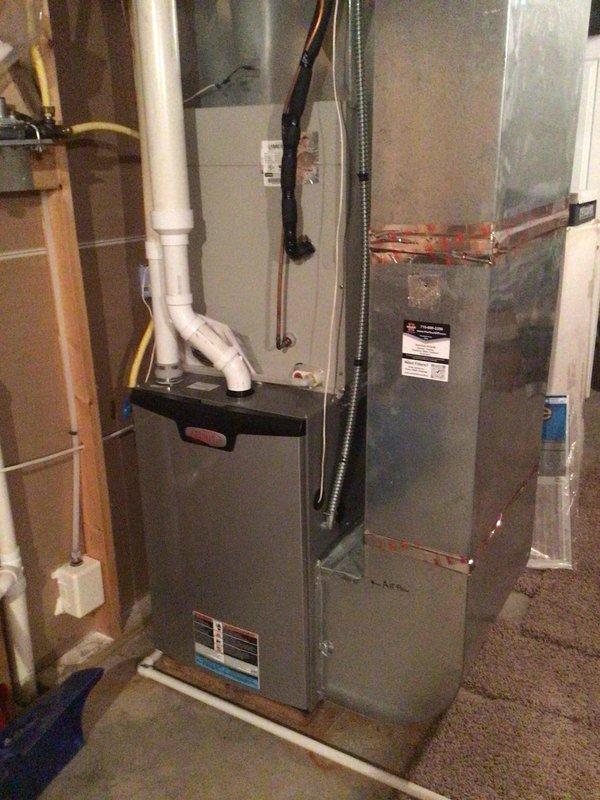 Completed comprehensive AC tune-up on 5-year-old system including washing outdoor condenser unit, testing electrical components (all readings within manufacturer specifications), and verifying airflow with 20° temperature drop across evaporator coil. Advised customer of exterior water spigot leak behind handle, likely requiring gasket replacement, which customer indicated they will repair themselves.