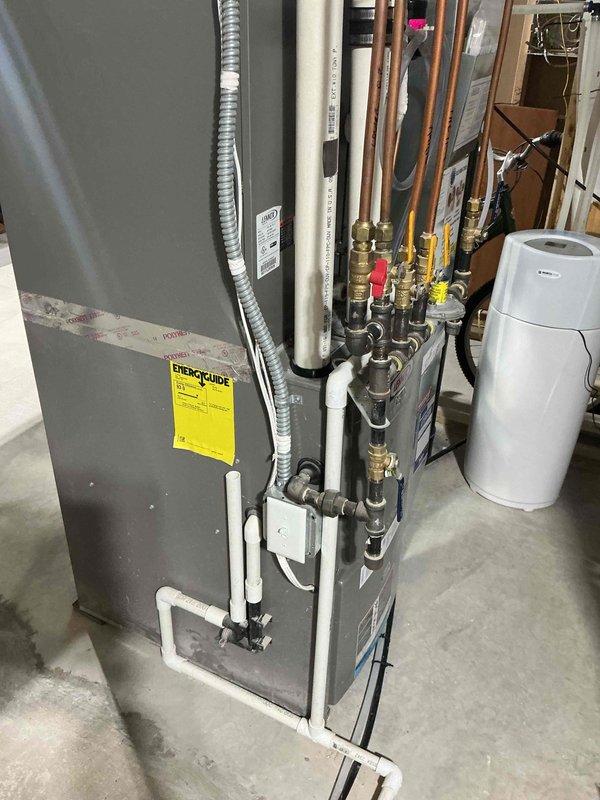Completed annual cooling maintenance visit on residential split system air conditioning unit. Performed comprehensive AC tune-up inspection including evaluation of outdoor condensing unit and indoor air handler components. During operational testing, identified deteriorated capacitor with visible rust and corrosion that could lead to system failure. Successfully replaced faulty capacitor with new component, restoring unit to proper operating condition. Verified all electrical connections, tested compressor operation, and confirmed system cooling performance meets manufacturer specifications. Unit now operating efficiently and reliably for continued seasonal use.