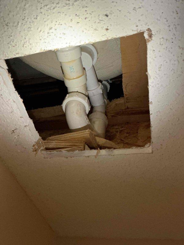 Completed annual plumbing inspection of residential property with all systems found in good working condition. Identified defective Roman tub strainer and performed replacement to restore proper drainage function. Accessed plumbing infrastructure through ceiling access point to verify condition of PVC drain and vent lines, which showed normal aging but remained structurally sound.