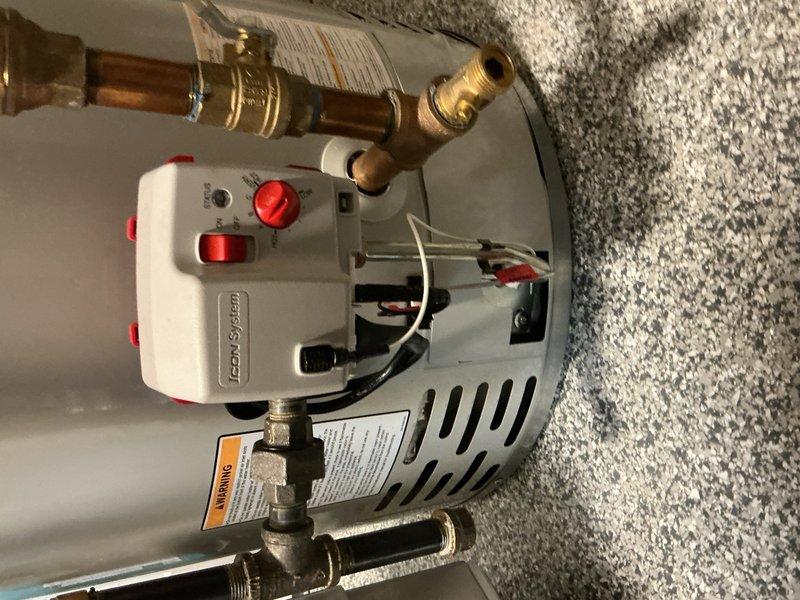 Replaced defective burner assembly on Bradford White water heater under warranty. Original burner assembly exhibited ignition failure, requiring multiple attempts to light. Installed new factory burner assembly, which ignited successfully on first attempt. Performed two complete heating cycles to verify proper operation and confirm reliable ignition performance.