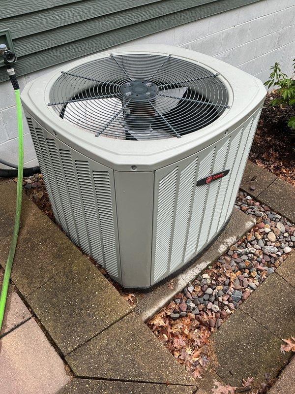 Completed scheduled maintenance tune-up on 13-year-old R410A air conditioning system. Replaced pitted contactor to ensure reliable operation. Documented equipment make, model, and serial numbers with photographs per service request. Comfort advisor scheduled to discuss system replacement options, as homeowner is considering full unit replacement due to previously identified cracked heat exchanger from winter service call.