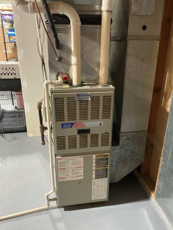 Responded to no-cooling complaint on 10-year-old residential air conditioning system. Upon arrival, activated unit and observed compressor operating but condenser fan motor not spinning. Removed access panel and verified electrical connections were intact. Manually freed seized motor shaft, which allowed temporary operation, but motor exhibited abnormal noise indicating imminent failure. Replaced failed condenser fan motor and installed new capacitor to ensure proper operation. System startup confirmed normal operation with 18-degree temperature split across evaporator coil, restoring full cooling capacity.