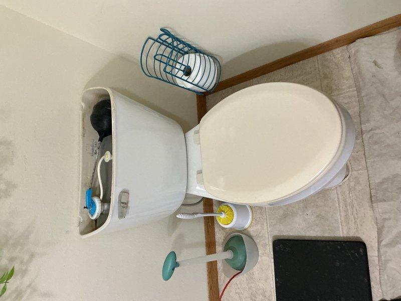 Responded to upstairs bathroom for clogged toilet caused by set of vehicle keys that had been accidentally dropped into the bowl. Provided customer with options for either attempting extraction and cleaning versus full toilet replacement. Customer elected to proceed with new installation. Removed existing toilet and installed new Gerber comfort height model. Successfully retrieved keys from base of old toilet during removal. Tested new installation for proper operation and verified no leaks present at water supply connection and floor flange seal.
