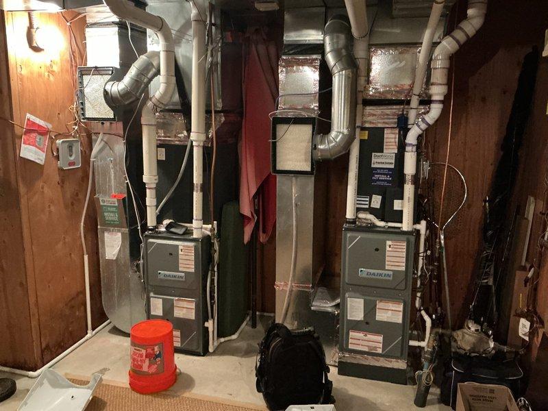 Completed annual cooling maintenance visit on two Daikin AC systems (6 years old and 2 years old), both under warranty. Performed comprehensive tune-up and inspection on both units; verified all components operating within manufacturer specifications, confirmed proper refrigerant charge levels and temperature splits across both systems. Addressed ongoing humidifier issues by testing system operation; confirmed new filter pad installation is functioning correctly and recommended more frequent filter replacement based on usage patterns. All equipment fully operational upon completion.
