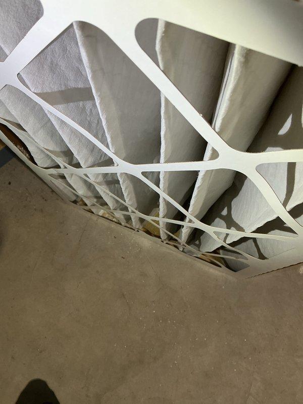Completed 12-4 AC tune-up and maintenance on a 12-year-old system found to be functioning properly. Inspected and replaced air filter, verified system temperatures with digital thermometer showing 100°F reading at supply duct, and confirmed proper operation of hard start kit. All HVAC components operating within normal parameters.