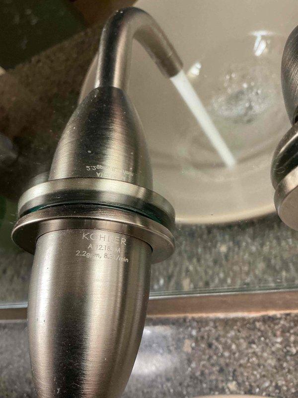 Completed comprehensive plumbing inspection of residential property and successfully replaced defective flush valve assembly in basement powder bathroom toilet, restoring proper flushing operation. Documented existing plumbing fixtures throughout property, including kitchen faucet and sink installations, with photographic records for maintenance history.