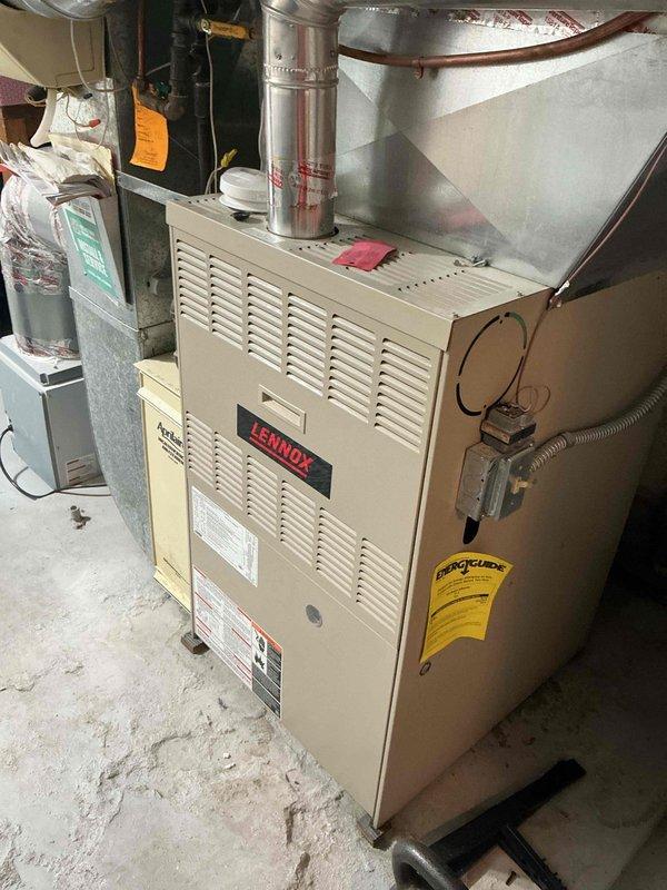 Completed annual cooling maintenance visit on two Lennox air conditioning systems. Performed comprehensive tune-up procedures on both AC units, including inspection of outdoor condenser units and indoor furnace components. Identified warranty-covered issues requiring repair and advised customer to contact Ditter for warranty service completion.