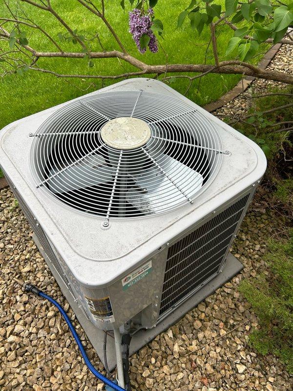 Completed annual cooling tune-up on residential air conditioning system. Performed comprehensive inspection including thermostat operation, air filter, blower assembly, condenser coil condition, electrical connections, contactor, capacitor, condensate drain, refrigerant performance, and temperature split. All readings within normal operating range with no mechanical or safety issues identified. System operating properly and performing as designed with no repairs needed at this time.